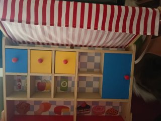 Colmado infantil nuevo con muchos accesorios