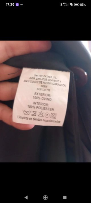 Gabardina de cuero con cuello de pelo