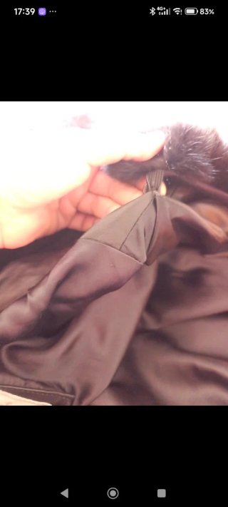 Gabardina de cuero con cuello de pelo