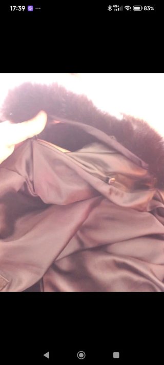 Gabardina de cuero con cuello de pelo