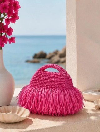 Bolso rosa fucsia de rafia hecho a mano con flecos