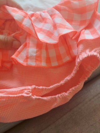 Conjunto bebé La Martina blanco y naranja fluor