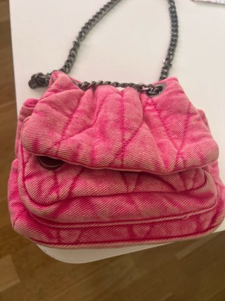 Bolso juvenil bandolera rosa.