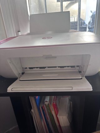 Impresora HP rosa y blanca