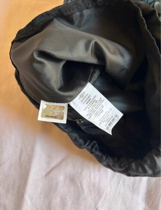 Mochila Eastpak estampada cuero
