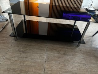 Mesa de centro de cristal negro con patas cromadas
