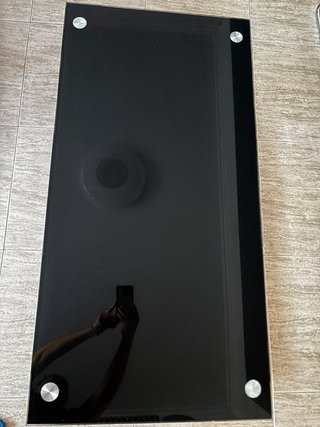 Mesa de centro de cristal negro con patas cromadas