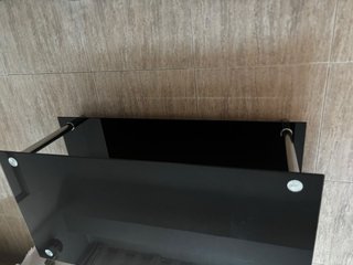 Mesa de centro de cristal negro con patas cromadas