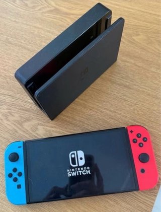 Nintendo Switch OLED Negra, Azul y Roja
