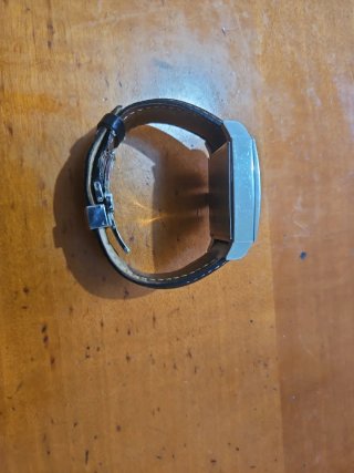Reloj Guess Negro y Plateado,