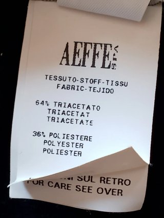 Abito Moschino V Nero con Mela Rosa