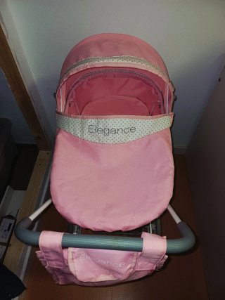 Carrito de muñecas rosa