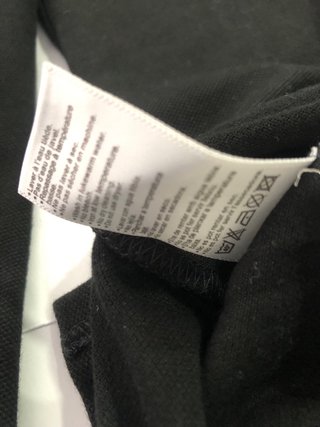 Polo Lacoste Negro Talla 6 equivale a una xl