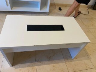 Mesa de centro blanca con hueco negro