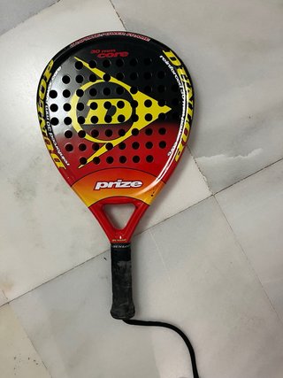 Funda y 4 palas de pádel Vairo y Dunlop