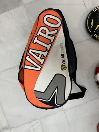 Funda y 4 palas de pádel Vairo y Dunlop