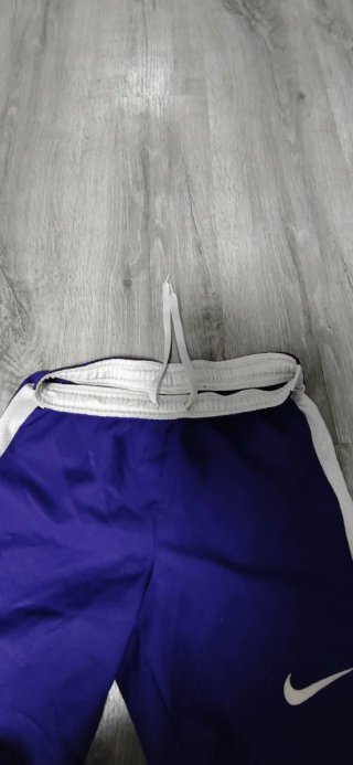 Pantalón corto deportivo Nike morado 9 años