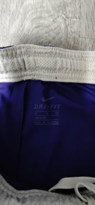 Pantalón corto deportivo Nike morado 9 años