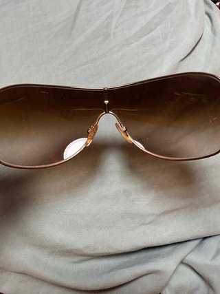 Gafas de sol Prada marrones y doradas