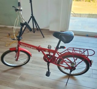 Bicicleta plegable Yogoice roja.