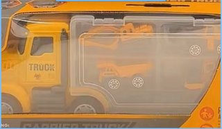 Camión Transportador con Máquinas de Construcción