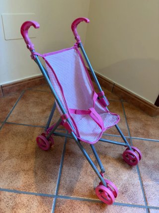 Cochecito de muñecas rosa