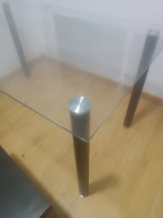 Mesa de comedor cristal patas negras