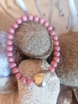 Conjunto de 3 pulseras doradas y rosas