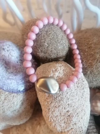 Conjunto de 3 pulseras doradas y rosas