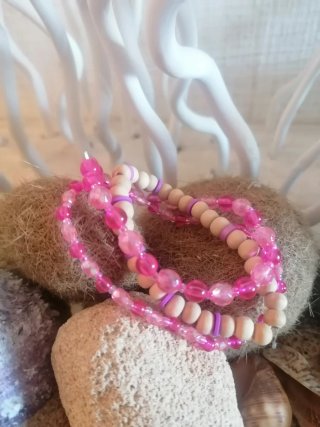 Conjunto de 3 pulseras doradas y rosas