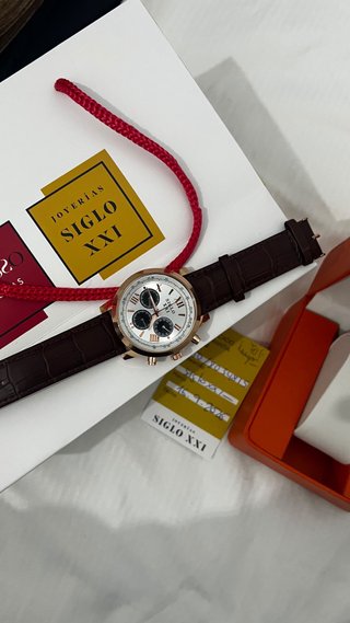 Reloj Siglo XXI Dorado y Marrón