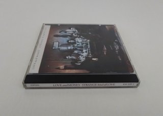 CD Love and Money Strange Kind Of Love