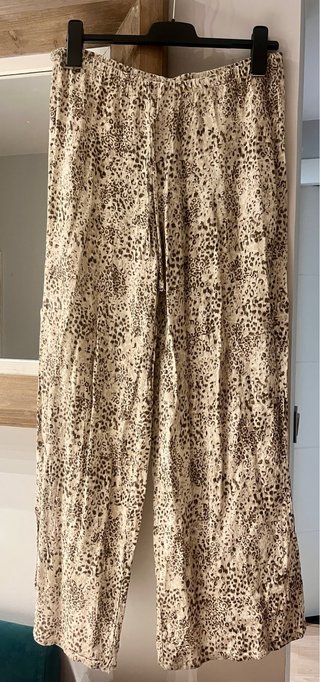 Pantalón palazzo fluido animal print