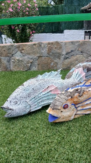 Peces de madera maciza decorativos