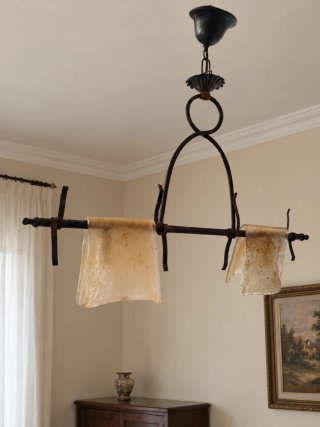 Lampadario in metallo e vetro
