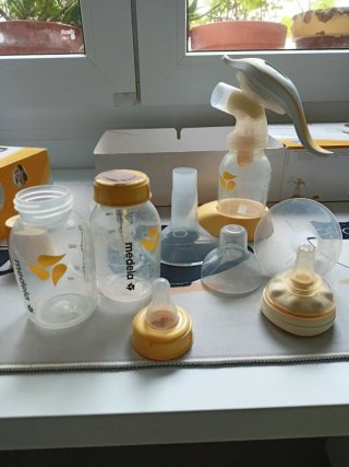 Sacaleches Medela Harmony con accesorios