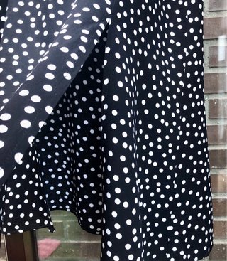 Rebajadísima Falda midi lunares botones