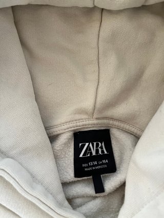 Sudadera niño gráfica beige y naranja