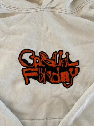Sudadera niño gráfica beige y naranja