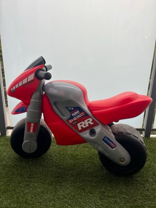 Moto de juguete infantil roja y gris