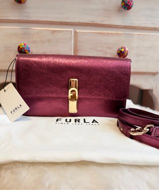 Bolso Furla metálico morado y dorado. Modelo Iride