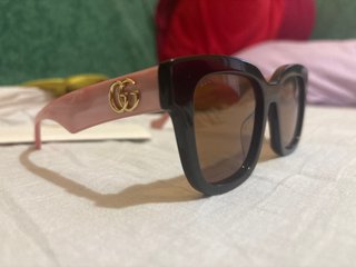 Occhiali da sole Gucci neri e rosa