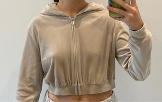 Sudadera beige de terciopelo con cremallera