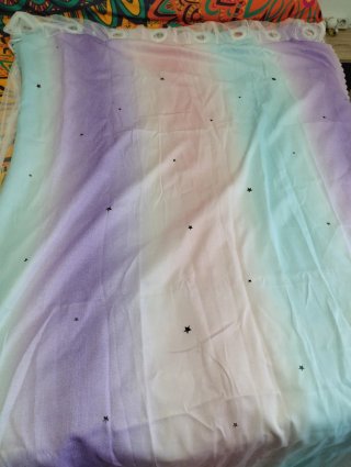 Cortina infantil multicolor con estrellas