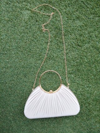 Bolso de fiesta dorado y blanco
