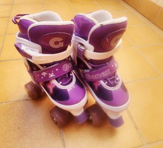 Patines de 4 ruedas morados para niña