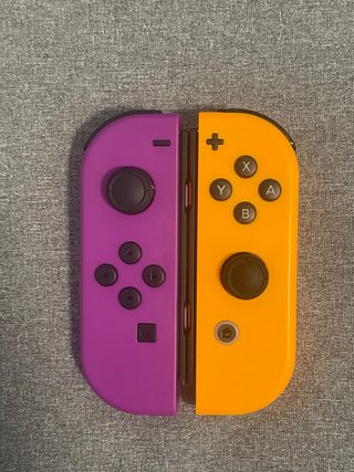 Mandos Nintendo Switch Morado y Naranja