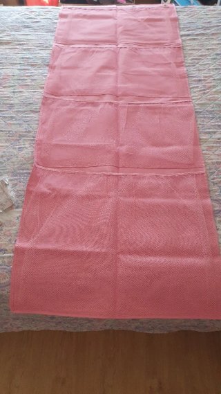 Organizador con bolsillos rosa para puerta