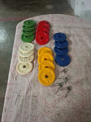 Pesas de gimnasio de colores