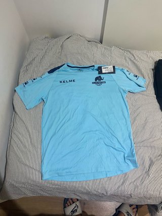 Camiseta deportiva Kelme azul Les Corts Ubae